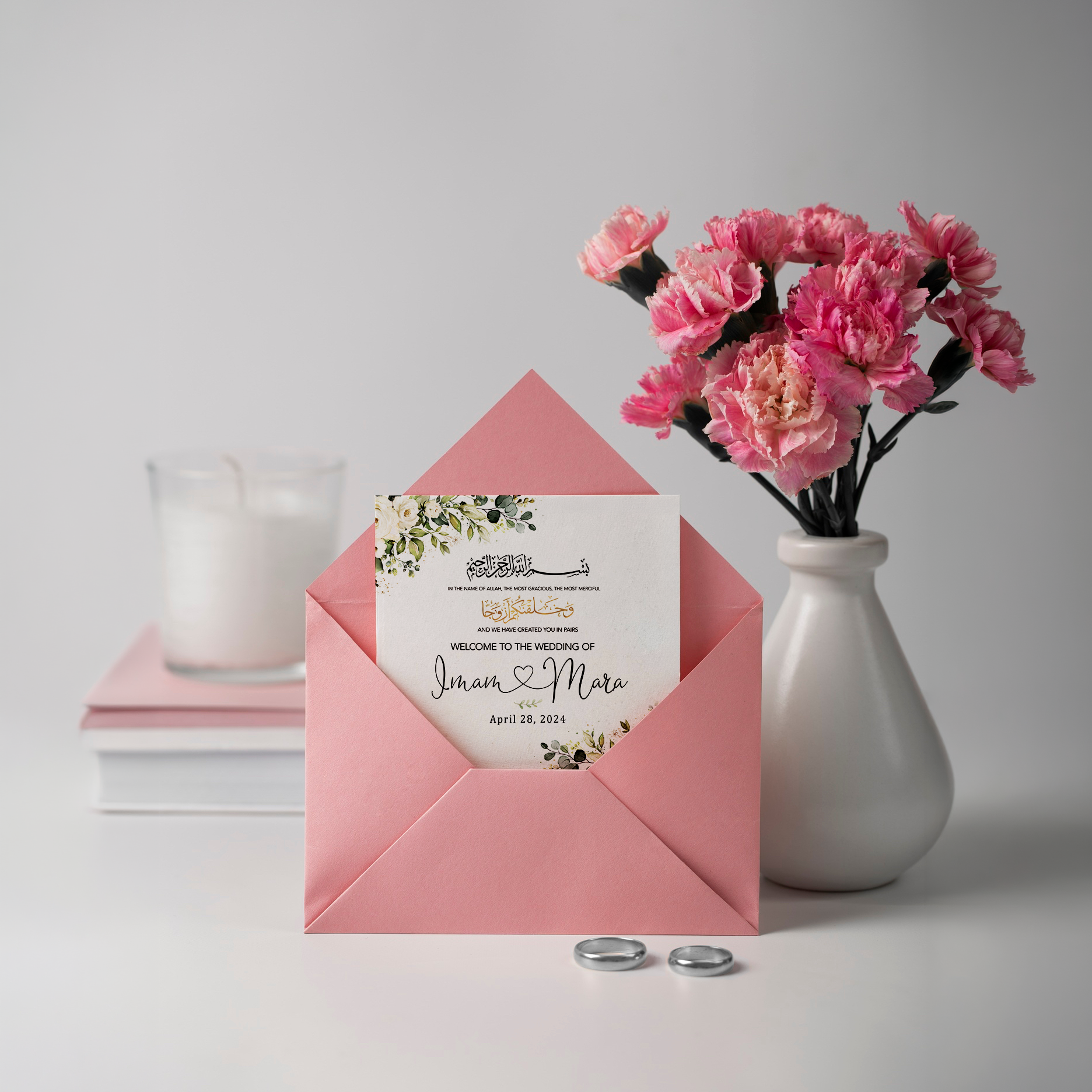 Elegant botanical wedding invitation and pink envelope mockup featuring custom gold script, produced by Alison's Printshop.