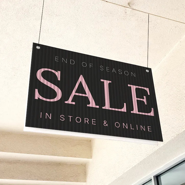 Custom hanging coroplast signs ready for printing - Lightweight, durable signage for retail stores and indoor displays | Alison's Printshop in Mahwah, NJ.